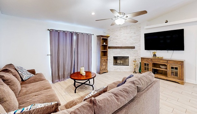 Updated home with patio, grill, wood-burning fireplace, central AC, & internet