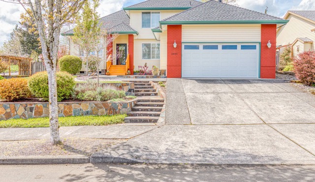 Updated home with pergola, deck, gas grill, WiFi, & landscaped backyard