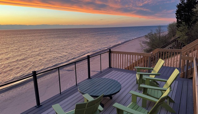 Updated lakefront oasis with private beach, fire pit, amazing views & waterside balcony!