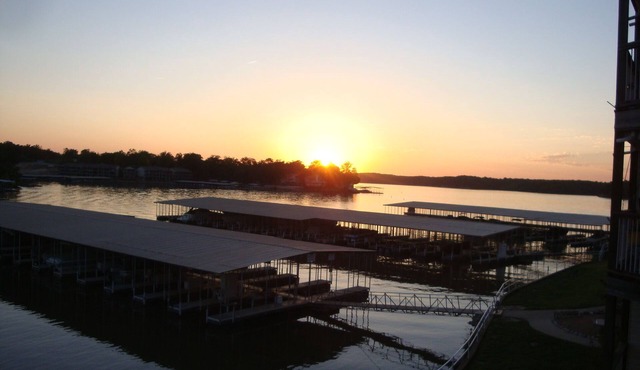 UPDATED LAKEFRONT WALK-IN UNIT, 2 POOLS, BEACH, DECK