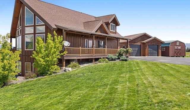 Updated, mountain-view retreat with private hot tub, game room, deck & firepit