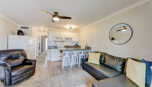 Updated oceanfront condo with balcony, AC, WiFi, pool, pier, & beach access
