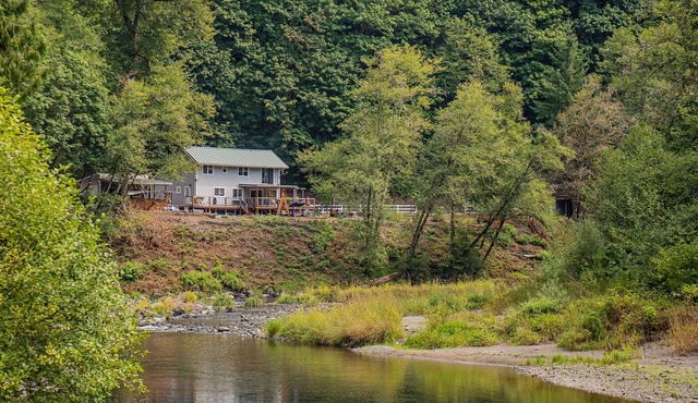 Updated Riverfront Home with Stunning Views, Deck, Kayaks, Fireplace