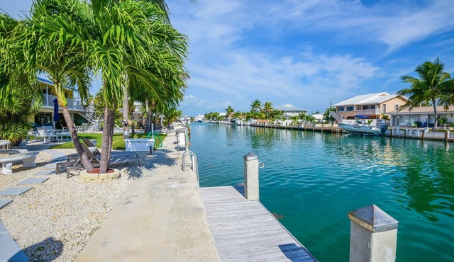 UPDATED WATERFRONT 2/2 w/37-ft Dock, Cabana Club, Kayak, Bikes & Ample Parking