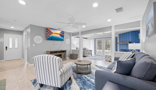 Updated Waterfront Pool Home with Putting Green