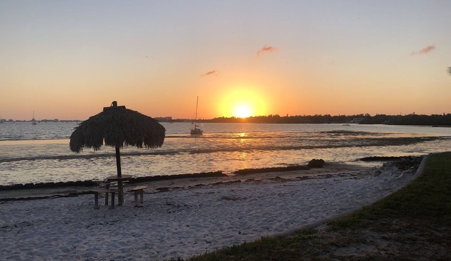 Upgraded Waterfront Condo Steps Away From Private Beach with Spectacular Sunsets