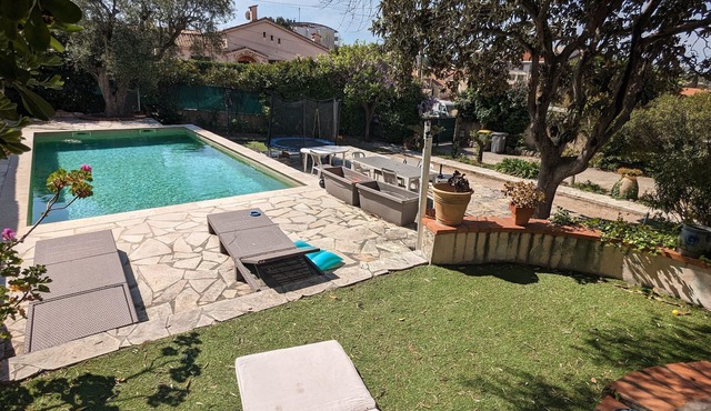 Upper villa with swimming pool and private grounds.