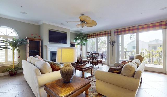 Upscale condo with large deck & shared pool - just steps from the beach