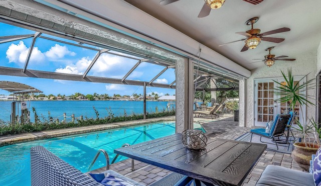 Upscale lakefront home w/private saltwater pool, dock, free WiFi, & central AC
