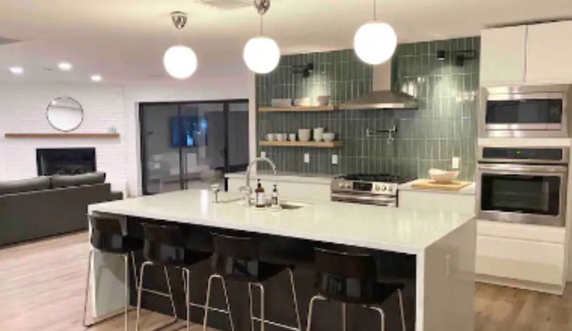 Uptown remodeled home and heated pool