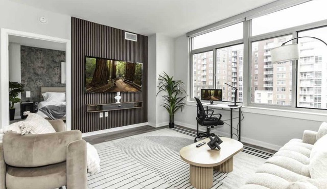 Urban 2BR Getaway with Rooftop Views, Gym & Parking