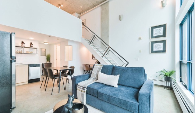 Urban Loft | 5 Mins to Saddledome | Heated Parking | Sofa Bed