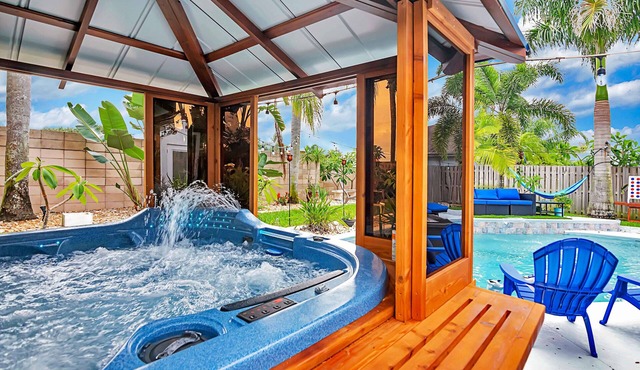 Urban Oasis W/hot Tub, Heated Pool And Private Movie Theater 2 Bedroom Home by RedAwning