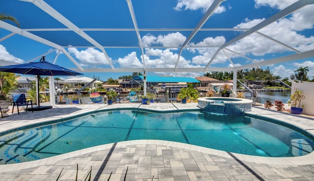 Fun'n Sun - 3 BR/3 bath waterfront home in beautiful Matlacha Isles/pool/spa/dock/fishing poles