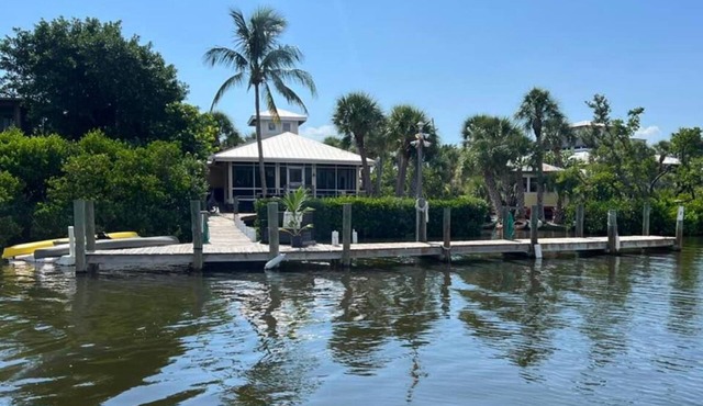 Use our kayaks to explore; your boat is in view at our dock; boardwalk to beach