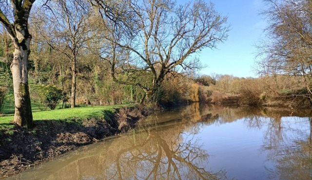 Vacation home in the countryside on the banks of a river.