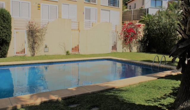 Vacation Home 'Adosado A Un Paso Del Mar' with Shared Pool, Wi-Fi and Air Conditioning