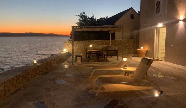 Vacation home Alessandro with whirlpool, directly by the sea