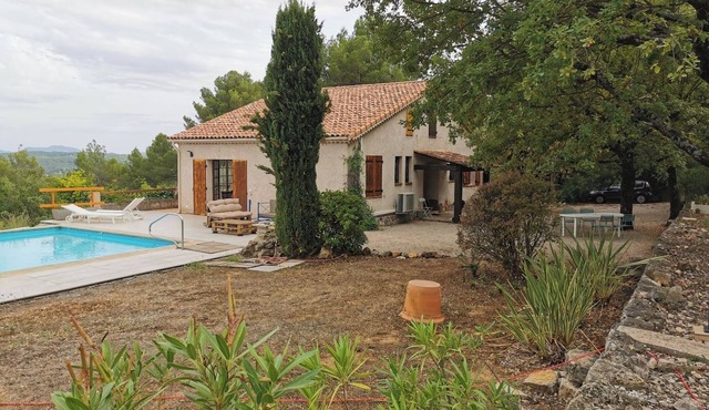 Vacation home in green surroundings with swimming pool