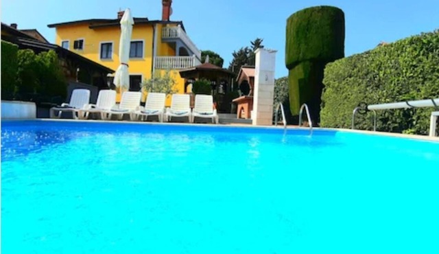 Vacation home * with heated pool and beautiful views of the sea.