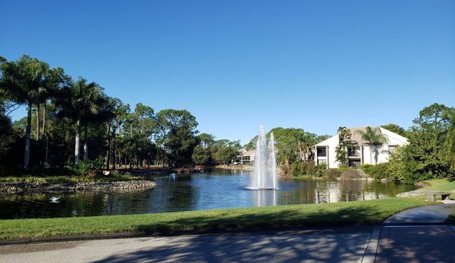 Vacation in the Forest CC heated pool view of golf course near beaches airport