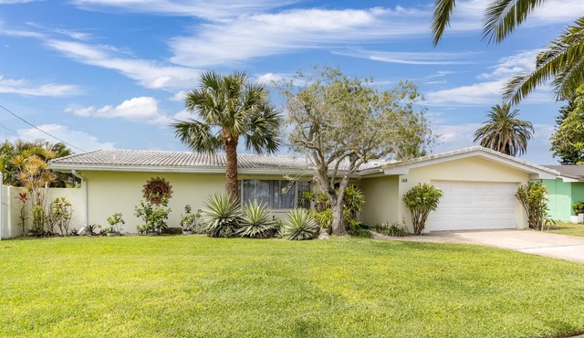 Vacation Rental Home -Near Beach, On a Canal with Pool - Great Location