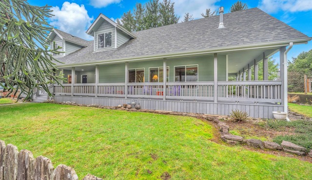 Vaulted Family Home with Wraparound Covered Porch