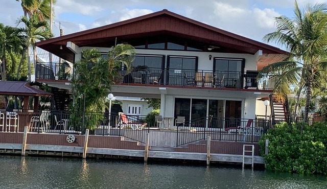 Venetian Shores Escape! Heated Pool, 3BR, 70ft Dock, Dog-Friendly!