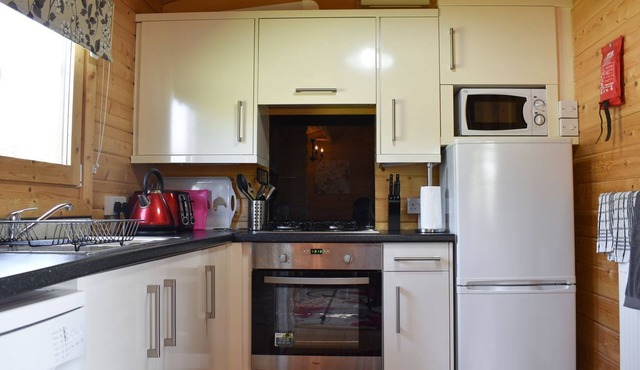 Venture off on a journey for two, and visit this delightful lodge complete with your own hot tub.