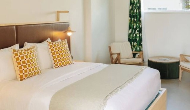 Vibrant Beachside Room Perfect for Relaxing Couples' Getaway