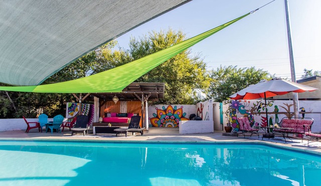 Vibrant Bohemian Loft Apartment with Shared Pool, Garden & Colorful Murals