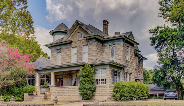 Victorian home with four bedrooms and four and one half bathrooms.