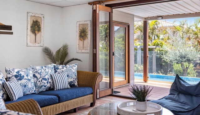 Victoria’s Poolside Emerald Beach stay with Shared Pool, Near Beach and Cafes.