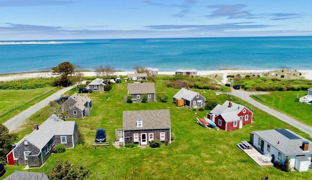 Views across Barnstable Harbor from the deck of this 2 br cottage with access to Association beach.