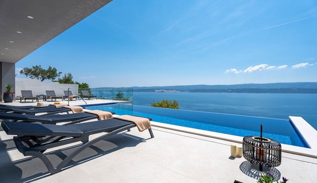 Villa Admira Maria with a heated pool and sea views
