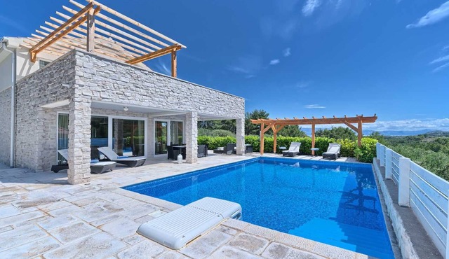 Villa Caprice - with a heated pool and a spa, for 10 guests on Island Hvar by MyWaycation