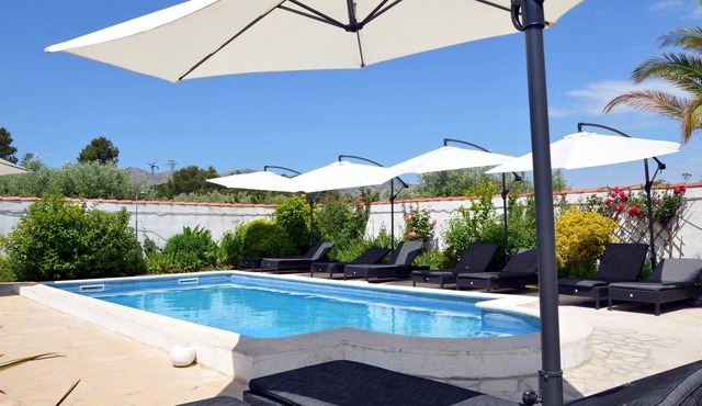 Villa Carpe Diem with six suites, private pool and landscaped garden.