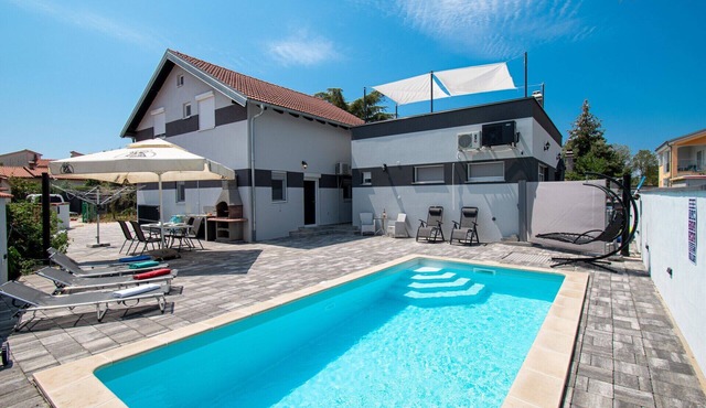 Villa Damjan is located in a peaceful place near the sea.