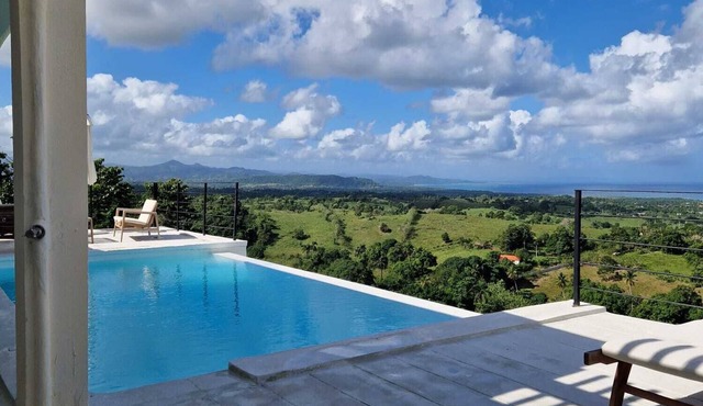 Villa elevated on a hill overlooking a majestic view of the sea