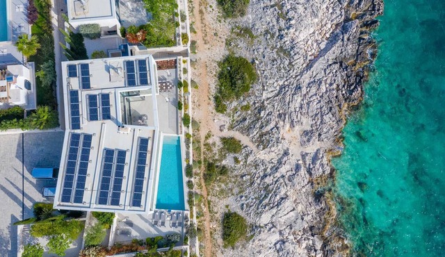 Villa Esperia - stunning waterfront villa with a heated pool and sauna in Rogoznica by MyWaycation