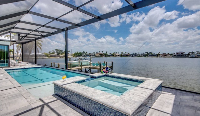 Villa Florida Orange -newly built at Eight Lakes, on water, modern, pool & spa