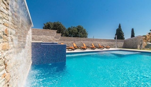 Villa for big demands with large pool, sauna, whirlpool, fitness equipment, billiards and professional outdoor kitchen
