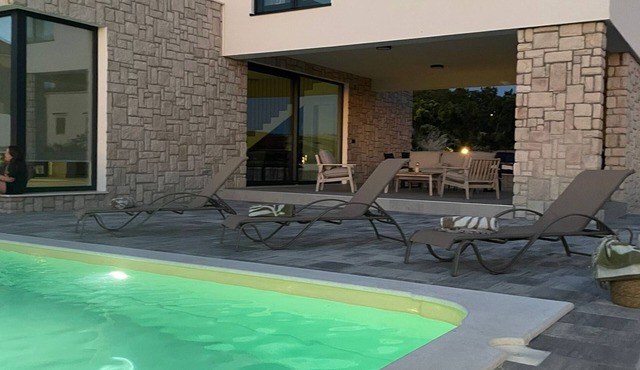 Villa Gligora - modern villa with beautiful view of the bay and the mountain.