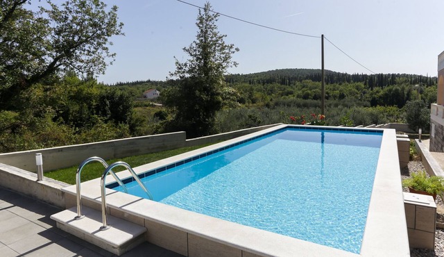 Villa Harmonia with patio and shared pool
