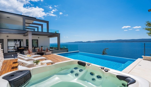 VILLA HRID Luxury beachfront villa, Jacuzzi, heated infinity pool with massage