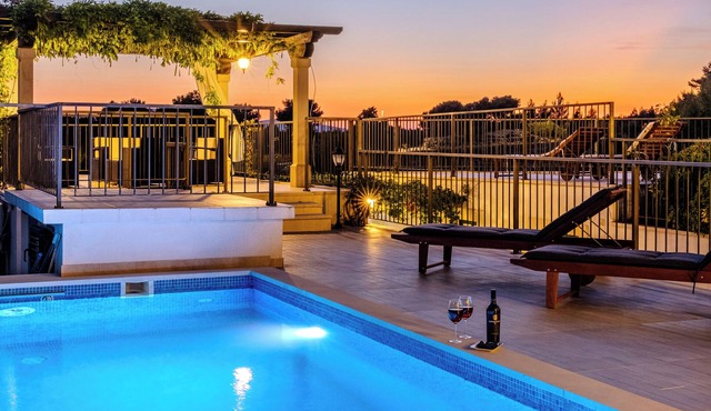 Villa Julia with a private heated pool and hot tub, ideal for large groups