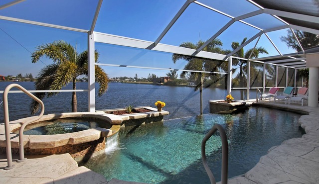Villa Laguna - Stunning Views! Elec & solar heated pool, spa on Gulf-access canal - SWFL Rentals