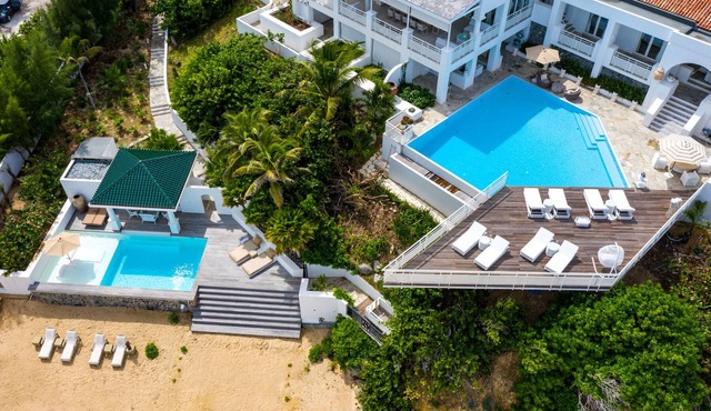 Villa L’Oasis – 6-Bedroom Luxury Beachfront Villa with Pools & Ocean Views in Baie Rouge, St. Martin