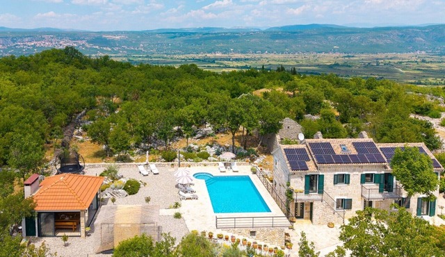 Villa Lugareva with 52 sqm private pool, 4 bedrooms, 4 bathrooms, summer kitchen, traditional environment, playground