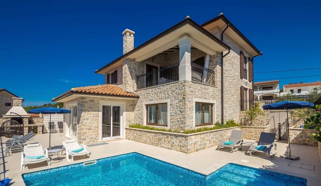 Villa LURDA with a magnificent sea view and heated pool